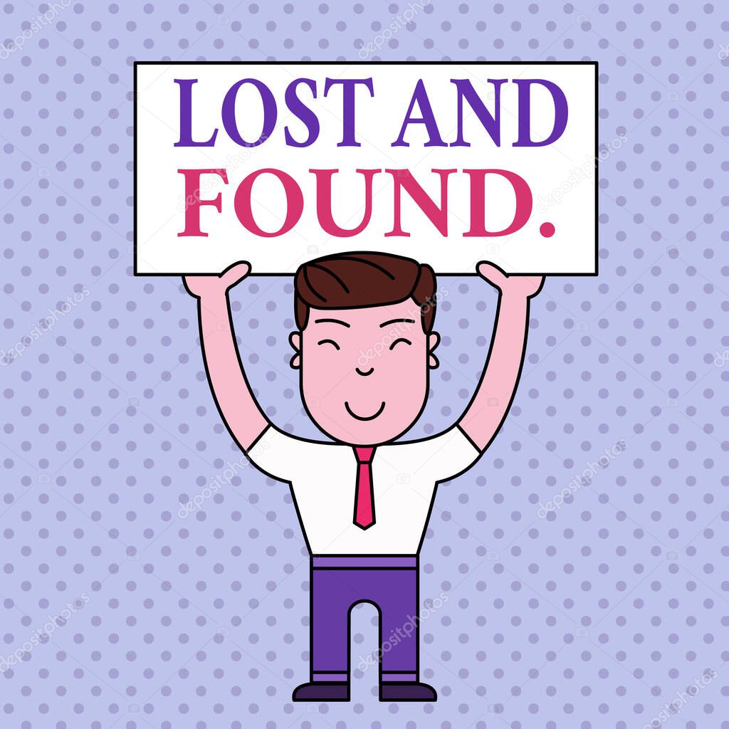Writing note showing Lost And Found. Business photo showcasing a place where lost items are stored until they reclaimed Smiling Man Standing Holding Big Empty Placard Overhead with Both Hands.