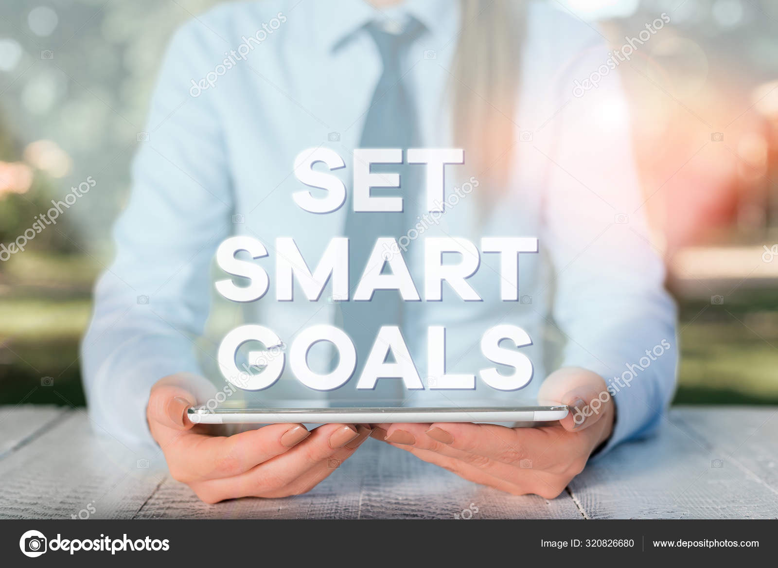 Handwriting Text Writing Set Smart Goals Concept Meaning Establish Achievable Objectives Make Good Business Plans Female Business Person Sitting By Table And Holding Mobile Phone Stock Photo Image By C Artursz