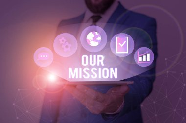 Conceptual hand writing showing Our Mission. Business photo showcasing A written declaration of an organization s is core purpose.