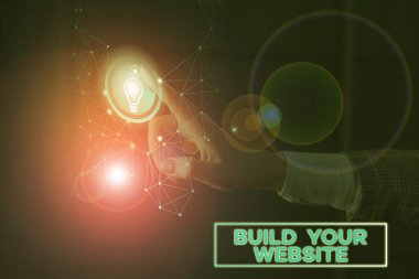 Sizin web sitesi oluşturmak gösterilen metin işareti. Kavramsal fotoğraf bir iş piyasası için bir e-ticaret sistemi kurma.