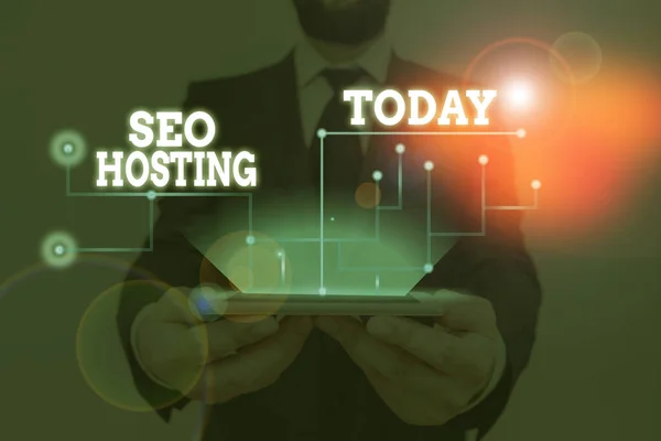 Seo Hosting 'i gösteren kavramsal el yazısı. Arama motorları için dostane bir şekilde iş fotoğrafı oluşturma web sitesi. — Stok fotoğraf