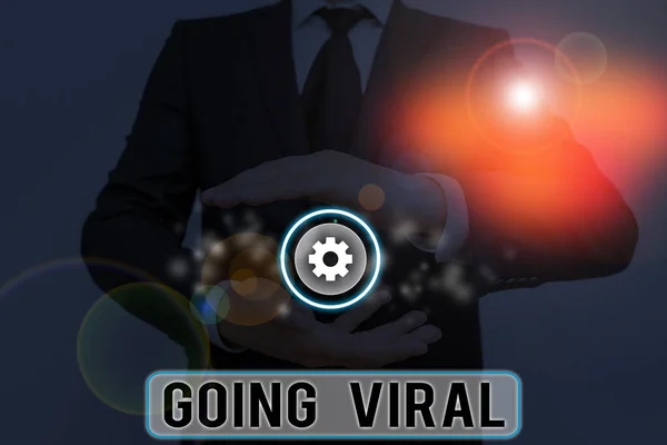 Text sign showing Going Viral. Conceptual photo something that that spreads rapidly through a population. — Stock Photo, Image