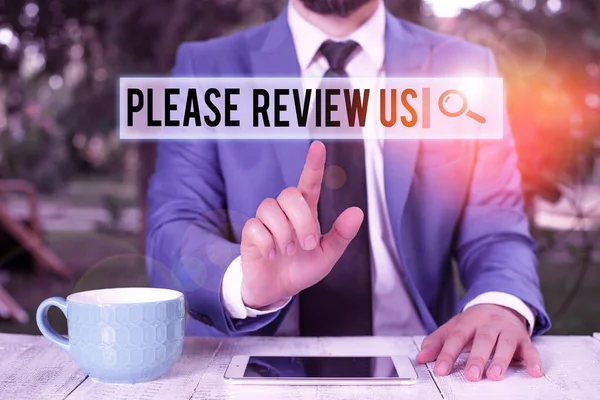 Handwriting text writing Please Review Us. Concept meaning Give a feedback Opinion Comments Quality of service Businessman with pointing finger in front of him. — Stockfoto