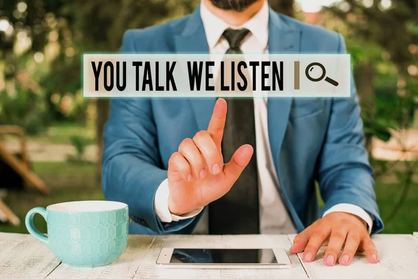 Handwriting text writing You Talk We Listen. Concept meaning Two Way Communication Motivational Conversation Businessman with pointing finger in front of him. — Stock Photo, Image