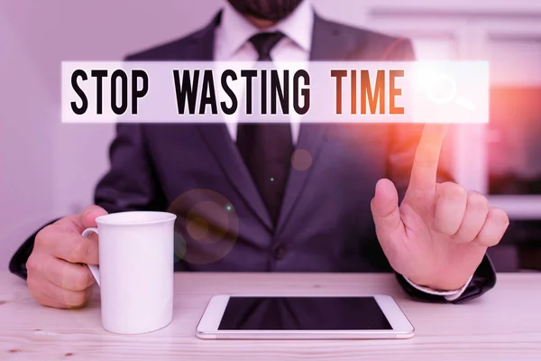 Text sign showing Stop Wasting Time. Conceptual photo Organizing Management Schedule lets do it Start Now Male human wear formal clothes present presentation use hi tech smartphone. — ストック写真