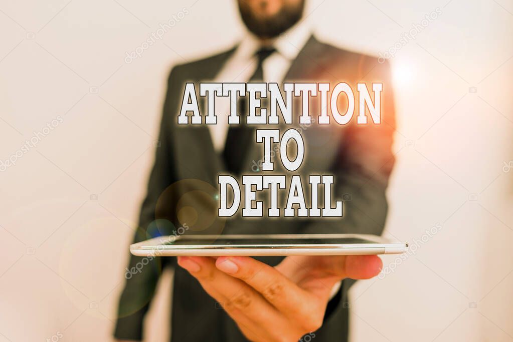 Word writing text Attention To Detail. Business concept for Achieve Thoroughness and Accuracy Exactly Aware Male human wear formal work suit hold smart hi tech smartphone use one hand.