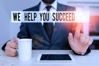Text sign showing We Help You Succeed. Conceptual photo Aided Supported Funded someone to reach his dreams Male human wear formal clothes present presentation use hi tech smartphone.