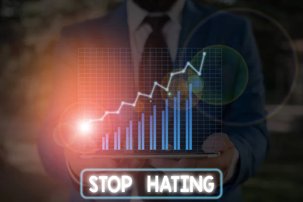 Conceptual hand writing showing Stop Hating. Business photo showcasing to drop all standards and wholeheartedly agree without question.