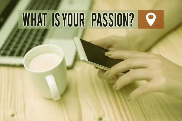 Word writing text What Is Your Passion Question. Business concept for asking about his strong and barely controllable emotion woman laptop computer smartphone mug office supplies technological devices