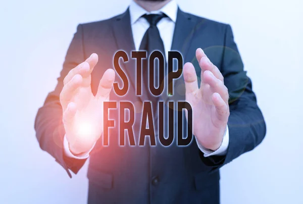 Writing note showing Stop Fraud. Business photo showcasing campaign advices showing to watch out thier money transactions Male human with beard wear formal working suit clothes hand. — Stockfoto