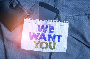Word writing text We Want You. Business concept for Company wants to hire Vacancy Looking for talents Job employment Smartphone device inside trousers front pocket with wallet and note paper.