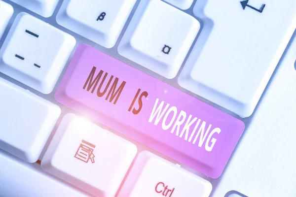 Writing note showing Mum Is Working. Business photo showcasing Financial Empowerment and professional progressing mother. — Stock Photo, Image