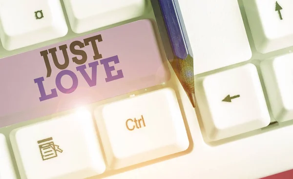 Manuscrito texto escrevendo Just Love. Conceito que significa estar interessado fisicamente em alguém Um apego emocional . — Fotografia de Stock