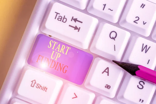 Handwriting text writing Start Up Funding. Concept meaning begin to invest money in newly created company or campaign White pc keyboard with empty note paper above white background key copy space. — Stock Photo, Image