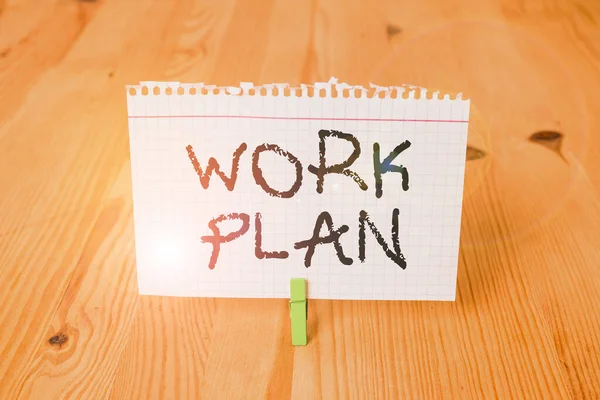 Tekst schrijven Werkplan. Business concept voor het project te bereiken en schetst hoe het zal worden gedaan Lege herinnering houten vloer achtergrond groene waspin groef sleuf kantoor. — Stockfoto