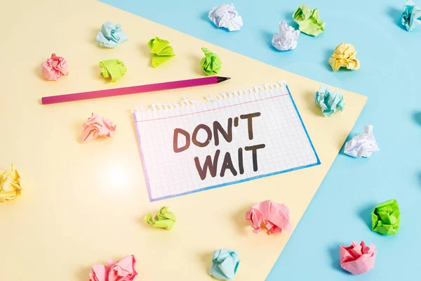 Word writing text Don T Wait. Business concept for Take action now and do something for a purpose Act quickly Colored crumpled papers empty reminder blue yellow background clothespin. — Stock Photo, Image