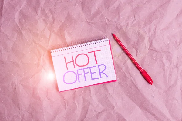 Writing note showing Hot Offer. Business photo showcasing product or programme that is offered at reduced prices or rates Papercraft desk square spiral notebook office study supplies. — 图库照片