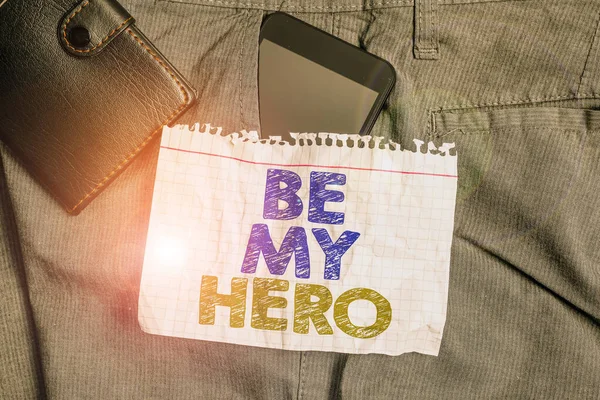 Word writing text Be My Hero. Business concept for Request by someone to get some efforts of heroic actions for him Smartphone device inside trousers front pocket with wallet and note paper. — Stock Photo, Image