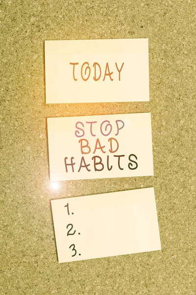 Text sign showing Stop Bad Habits. Conceptual photo asking someone to quit doing non good actions and altitude Vertical empty sticker reminder memo square billboard corkboard desk paper.