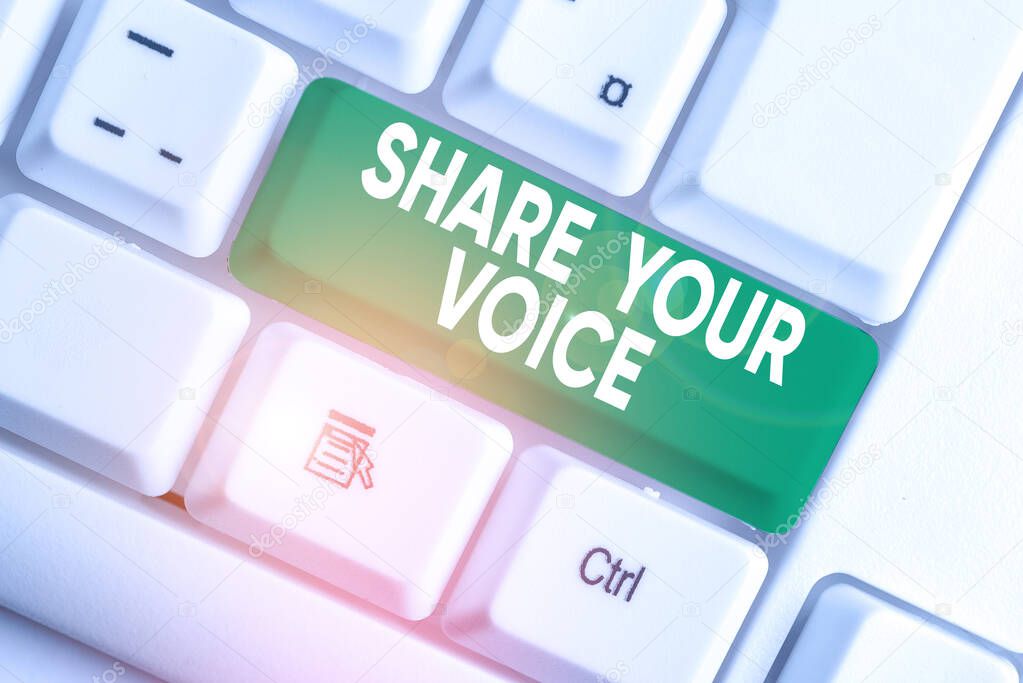 Writing note showing Share Your Voice. Business photo showcasing asking employee or member to give his opinion or suggestion White pc keyboard with note paper above the white background.