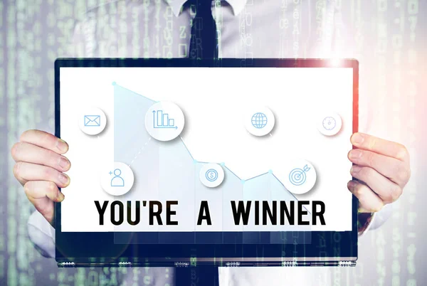 Word het schrijven van tekst You Re A Winner. Bedrijfsconcept voor Winnen als 1e plaats of kampioen in een wedstrijd. — Stockfoto