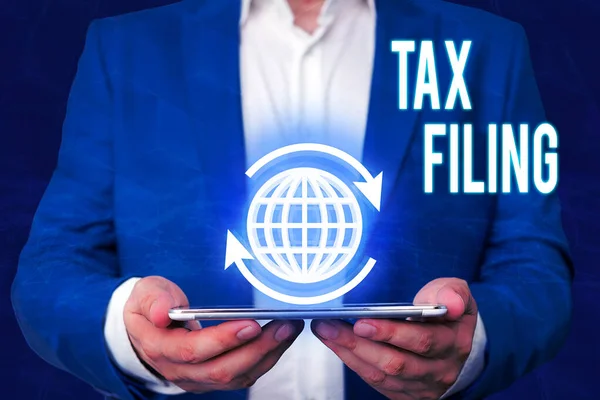 Word writing text Tax Filing. Business concept for Submitting documens filed with tax payer financial information. — Stok fotoğraf