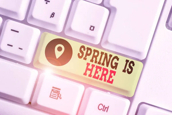 Conceptual hand writing showing Spring Is Here. Business photo text After winter season has arrived Enjoy nature flowers sun. — Stock Photo, Image