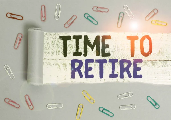 Handwriting text Time To Retire. Concept meaning Take the pensioner status stop working in elderly old enough Paper clip and torn cardboard placed above a wooden classic table backdrop. — Stockfoto