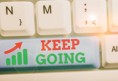 Handwriting text Keep Going. Concept meaning make an effort to live normally when in a difficult situation.