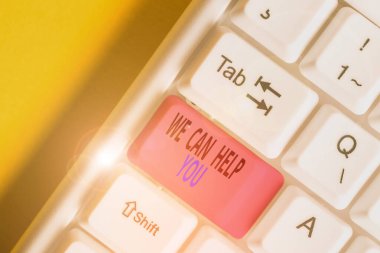 Handwriting text We Can Help You. Concept meaning Support Assistance Offering Customer Service Attention White pc keyboard with empty note paper above white background key copy space.