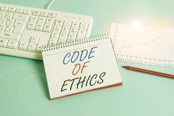 Text sign showing Code Of Ethics. Conceptual photo Moral Rules Ethical Integrity Honesty Good procedure Paper blue desk computer keyboard office study notebook chart numbers memo. — Stock Photo, Image