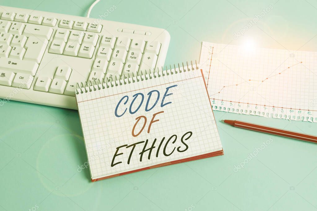 Text sign showing Code Of Ethics. Conceptual photo Moral Rules Ethical Integrity Honesty Good procedure Paper blue desk computer keyboard office study notebook chart numbers memo.