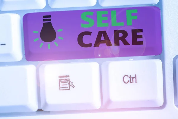 Writing note showing Self Care. Business photo showcasing practice of taking action preserve or improve ones own health. — Stock Photo, Image