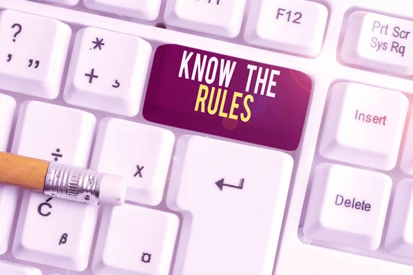 Text sign showing Know The Rules. Conceptual photo Learn the accepted principle or instructions to follow White pc keyboard with empty note paper above white background key copy space. — Stock Photo, Image