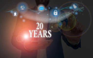 Conceptual hand writing showing 20 Years. Business photo showcasing Remembering or honoring special day for being 20 years in existence.
