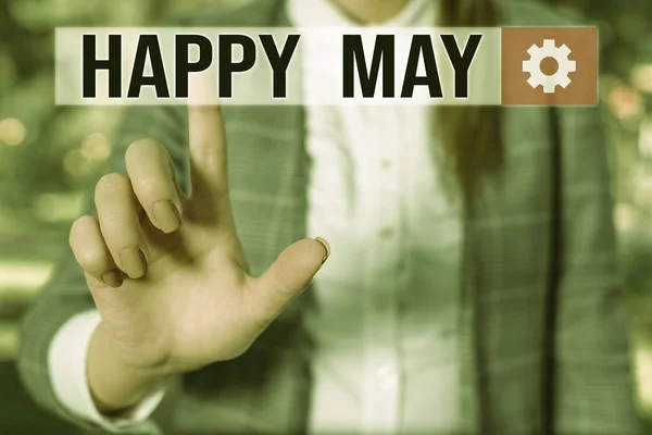 Text sign showing Happy May. Conceptual photo Happy new month Best wishes Fresh Start Celebrating Holiday Business woman in the nature pointing with the finger into empty space. — Stok fotoğraf