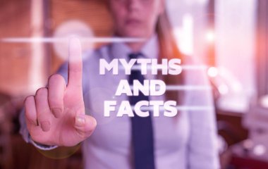 Word writing text Myths And Facts. Business concept for Oppositive concept about modern and ancient period Blurred woman in the background pointing with finger in empty space. clipart