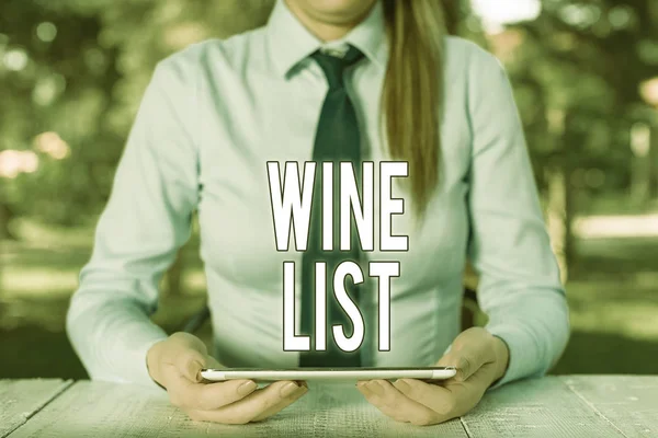 Writing note showing Wine List. Business photo showcasing menu of wine selections for purchase typically in a restaurant Female business person sitting by table and holding mobile phone.