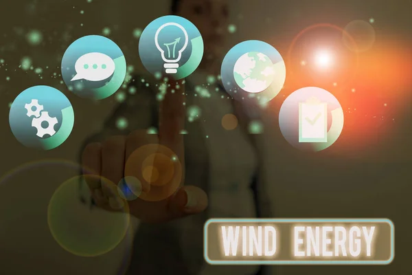 Conceptueel handschrift met Windenergie. Bedrijfsfoto toont het proces waarmee wind wordt gebruikt om elektriciteit op te wekken. — Stockfoto