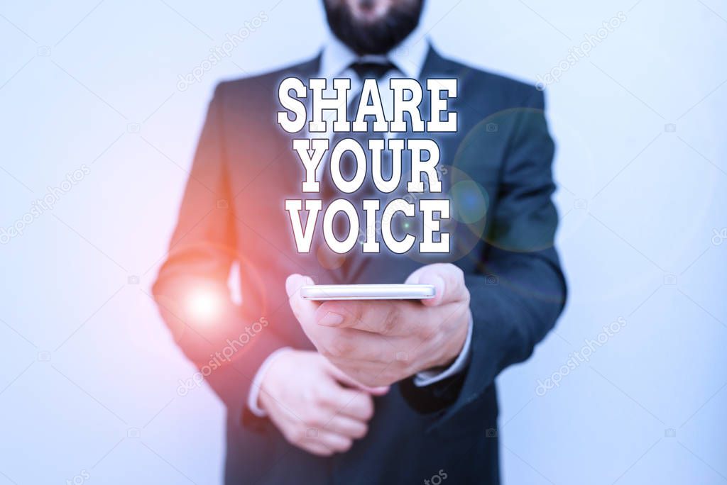 Text sign showing Share Your Voice. Conceptual photo asking employee or member to give his opinion or suggestion Male human wear formal work suit hold smart hi tech smartphone use one hand.