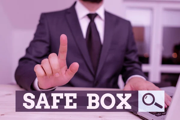 Conceptual hand writing showing Safe Box. Business photo showcasing A small structure where you can keep important or valuable things Male human wear formal clothes present use hitech smartphone.