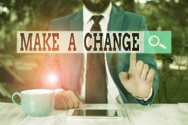 Text sign showing Make A Change. Conceptual photo Create a Difference Alteration Have an Effect Metamorphose Businessman with pointing finger in front of him. clipart