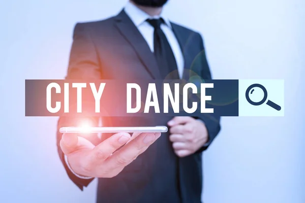 Handwriting text City Dance. Concept meaning activity of dancing for pleasure or in order to entertain others Male human wear formal work suit hold smart hi tech smartphone use one hand.
