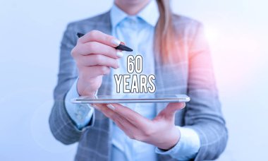 Handwriting text 60 Years. Concept meaning It is the onset of a golden era Commemorating a special day Business concept with mobile phone and business woman. clipart