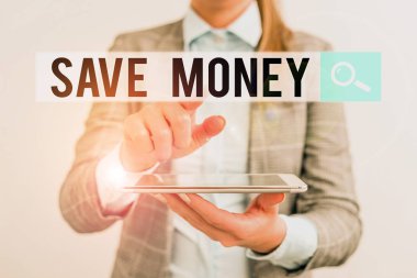 Word writing text Save Money. Business concept for store some of your cash every month to use them sometime later Business concept with mobile phone and business woman.
