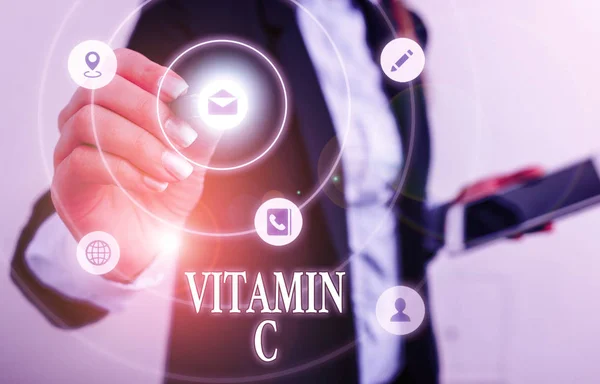 Textzeichen mit Vitamin C. Konzeptfoto fördert die Heilung und hilft dem Körper, Eisen Ascorbinsäure aufzunehmen. — Stockfoto