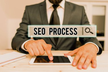 Conceptual hand writing showing Seo Process. Business photo text steps of increasing the quality and quantity of website traffic Male human wear formal clothes present use hitech smartphone.