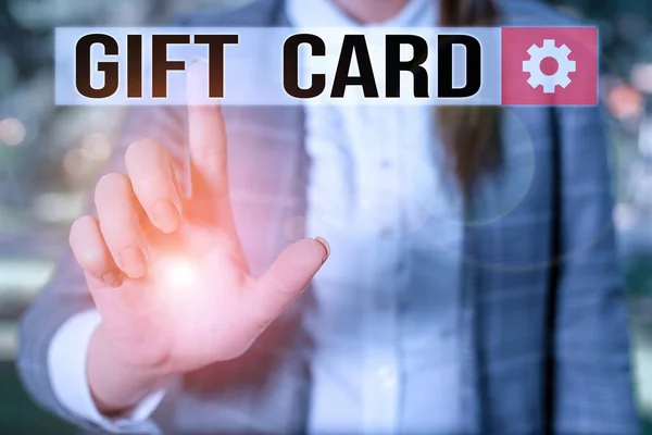 Text sign showing Gift Card. Conceptual photo A present usually made of paper that contains your message Business woman in the nature pointing with the finger into empty space. — Stock Photo, Image