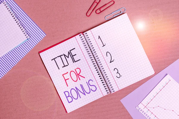 Conceptual hand writing showing Time For Bonus. Business photo text a sum of money added to a demonstrating s is wages as a reward Striped paperboard cardboard office study supplies chart. — Stock Photo, Image