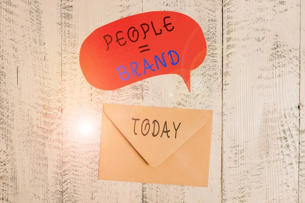 Handwriting text writing People Brand. Concept meaning Personal Branding Defining demonstratingality through the labels Front view closed envelop speech bubble lying wooden vintage background.